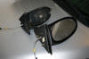 Broken mirror next to new one